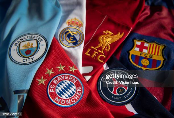 The badges of Manchester City, Bayern Munich, Real Madrid, Liverpool, Paris St-Germain and FC Barcelona, the top teams in the Champions League on...