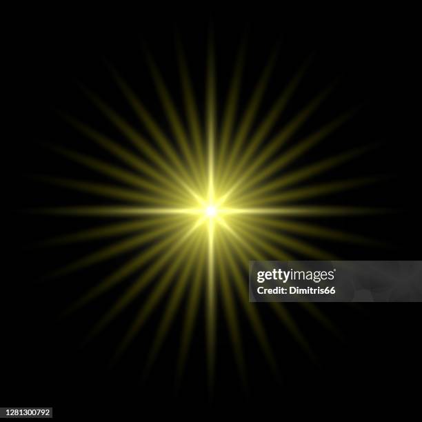 gold light star on black background - flashlight night stock illustrations