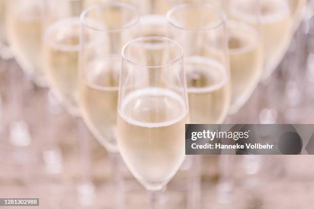 champagne glasses pyramid symmetric - champagne pyramid stock pictures, royalty-free photos & images