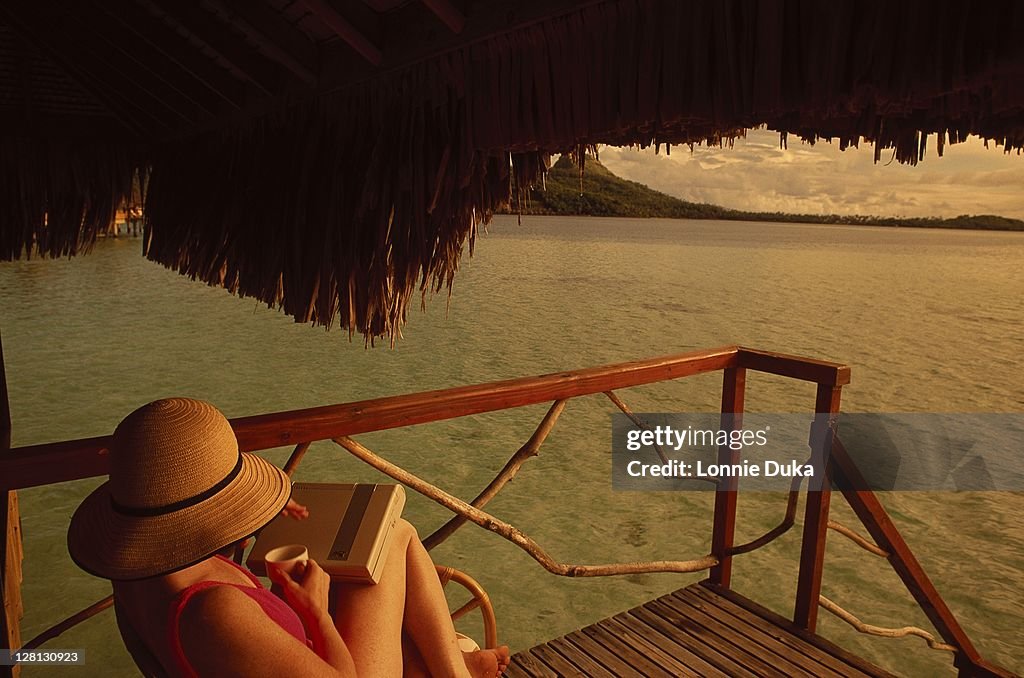 Woman w/laptop computer in Bora Bora