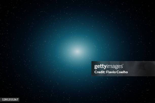 deep space starfield with glowing light source in the center background - the big bang theory foto e immagini stock