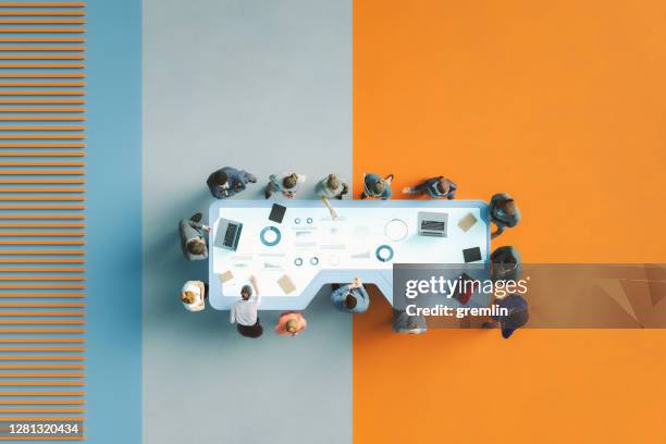 business meeting in the office - people sitting around table top view stock pictures, royalty-free photos & images