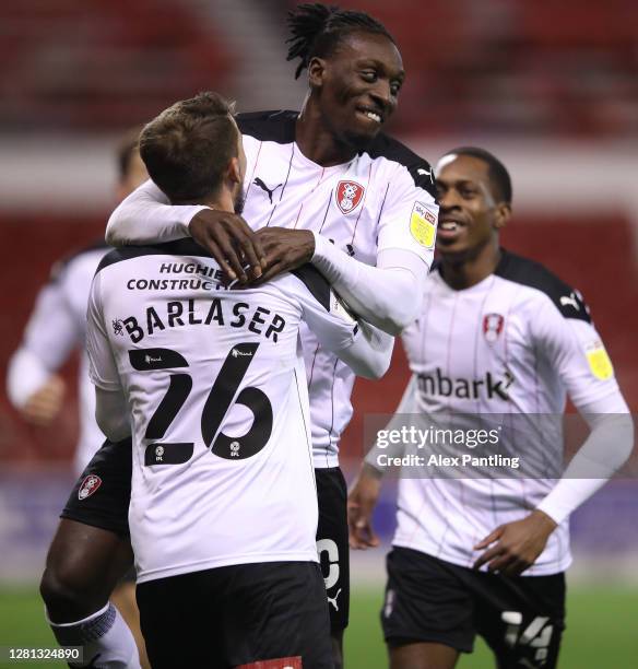 Daniel Barlaser of Rotherham United celebrates with teammate Freddie Ladapo after scoring his sides first goal during the Sky Bet Championship match...