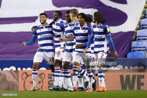 Lucas Joao of Reading celebrates with teammates after scoring his sides first goal during the Sky Bet Championship match between Reading and Wycombe...