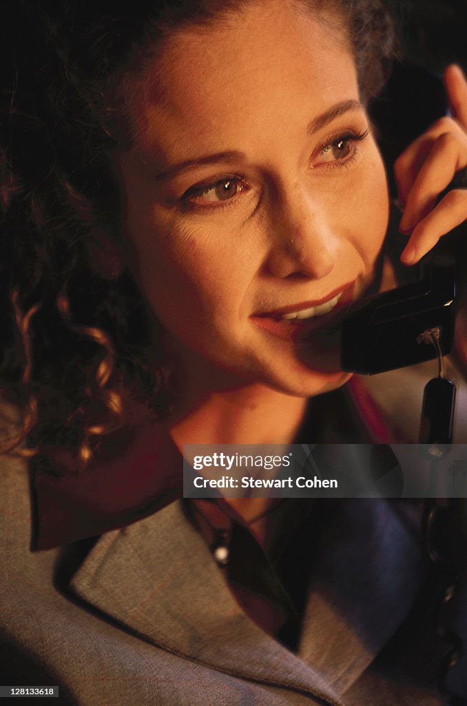 Businesswoman using the telephone