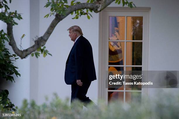 President Donald Trump walks out of the White House on October 20, 2020 in Washington, DC. Trump is headed to a rally in Pennsylvania, first lady...