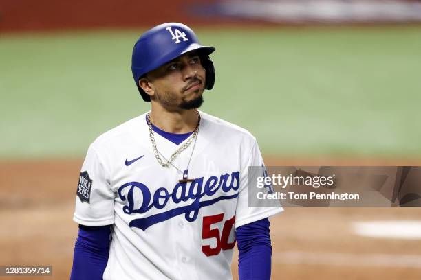 Mookie Betts of the Los Angeles Dodgers reacts after striking out against the Tampa Bay Rays during the third inning in Game One of the 2020 MLB...