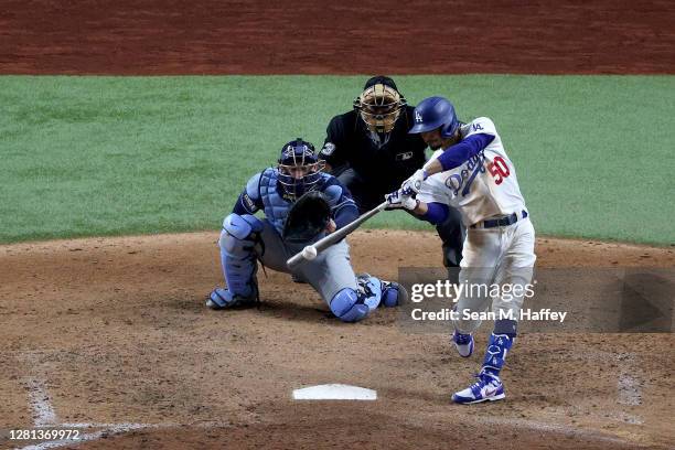 Mookie Betts of the Los Angeles Dodgers hits a solo home run against the Tampa Bay Rays during the sixth inning in Game One of the 2020 MLB World...