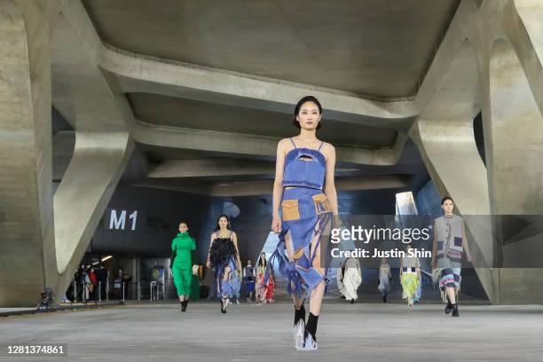 In this image released on OCTOBER 21, models showcase designs by PAINTERS at the pre-shooting of runway show as a part of GENERATION NEXT Designers...
