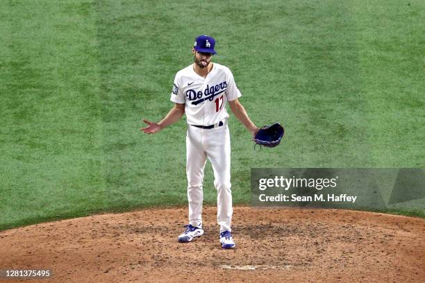 Joe Kelly of the Los Angeles Dodgers celebrate after closing out the teams 8-3 victory against the Tampa Bay Rays in Game One of the 2020 MLB World...