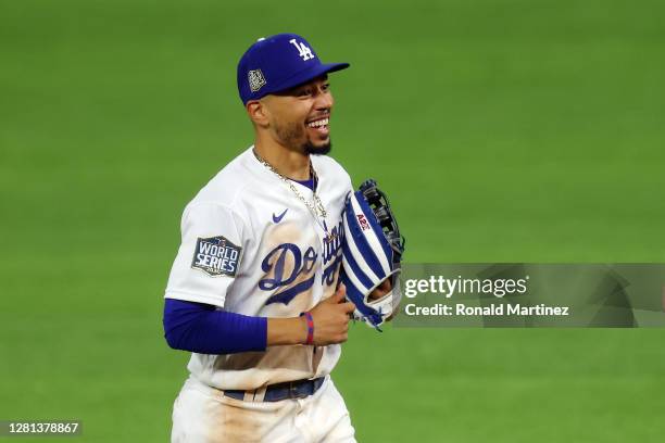 Mookie Betts of the Los Angeles Dodgers celebrates the teams 8-3 victory against the Tampa Bay Rays in Game One of the 2020 MLB World Series at Globe...