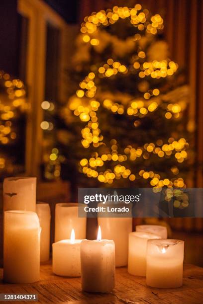 christmas decorations in xmas home - winter candlelight stock pictures, royalty-free photos & images