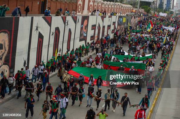 Members of several indigenous tribes demonstrate in Plaza de Bolivar against the massacres and the killing of social leaders, violence in their...