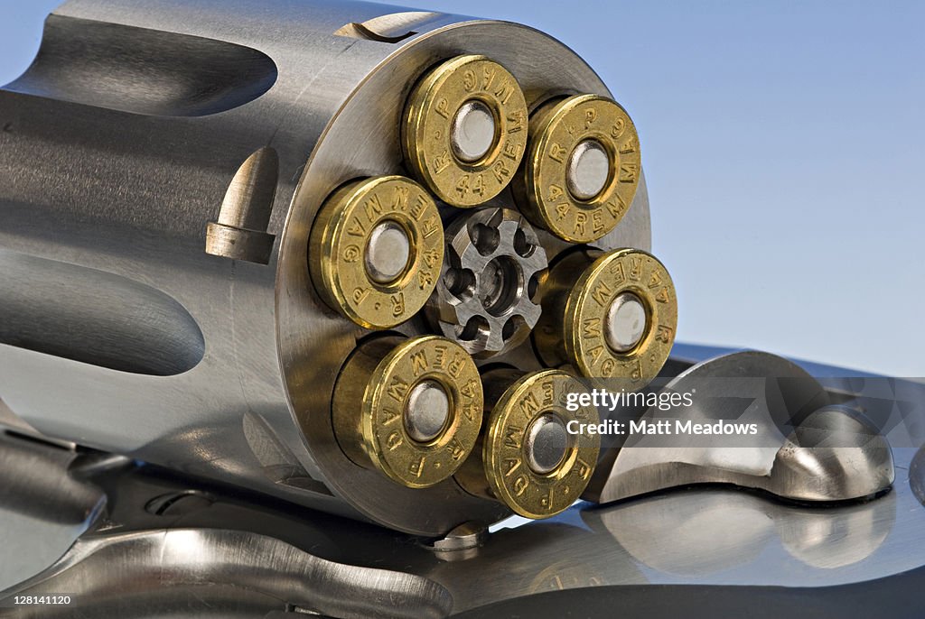 A 44 Magnum revolver showing the six-shot cylinder with ammunition.
