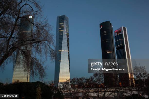 The four skyscrapers in the CTBA area , rise against the sky on January 1 in Madrid, Spain. The CTBA business district is in the La Castellana area...