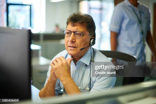 telephone triage - triage stock pictures, royalty-free photos & images