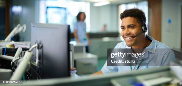 medical hotline - male medical professional stock pictures, royalty-free photos & images