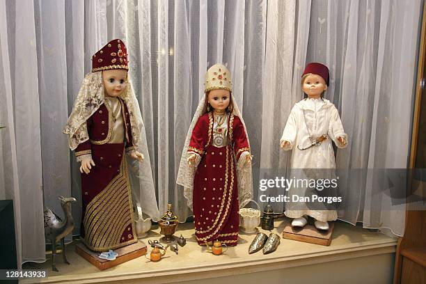 dolls with original morrocan costumes displayed for the holiday mimouna, traditional north african jewish celebration held the day after passover. jerusalem. israel. - mimouna stock pictures, royalty-free photos & images