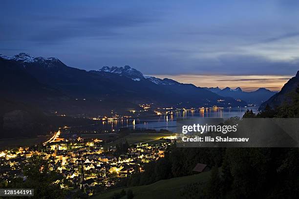 walensee lake at dusk. heidiland, swiss alps, switzerland - heidiland stock pictures, royalty-free photos & images