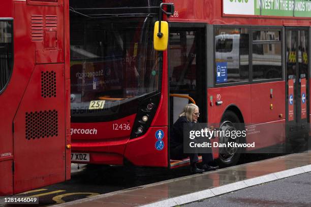 Bus driver takes a break on October 21, 2020 in London, England. The London Mayor's office has released news that the Government are proposing to...