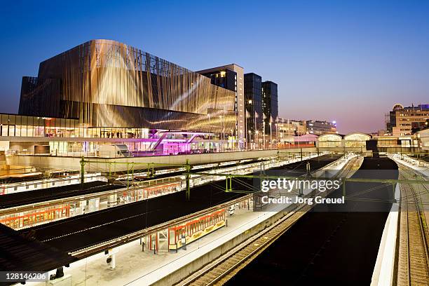 waterfront congress centre and central station - centraal station stock pictures, royalty-free photos & images