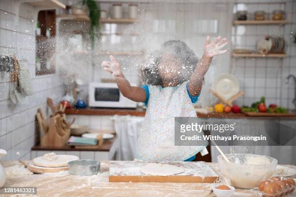 happy family funny kids bake cookies in kitchen - baking fotografías e imágenes de stock