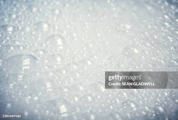 foam bubble background - detergente líquido fotografías e imágenes de stock