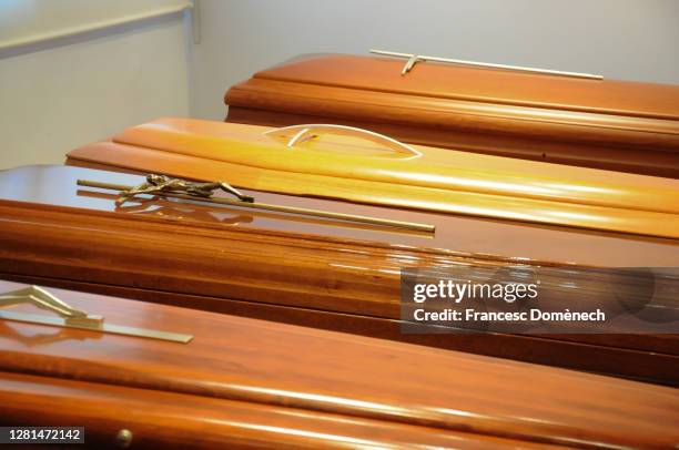 coffins - funeral casket stock pictures, royalty-free photos & images