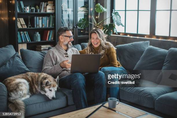 new normal way to hang with friends - sofa stock pictures, royalty-free photos & images