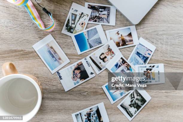 photos on vacation in a table - stock photo - fotostock stock-fotos und bilder