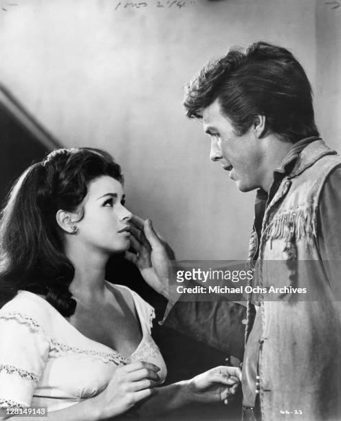 Tom Tyron greets Senta Berger in a scene from the film 'The Glory Guys', 1965.