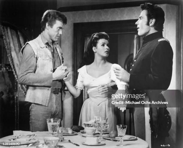 Harve Presnell and Tom Tryon are both in love with Senta Berger in a scene from the film 'The Glory Guys', 1965.