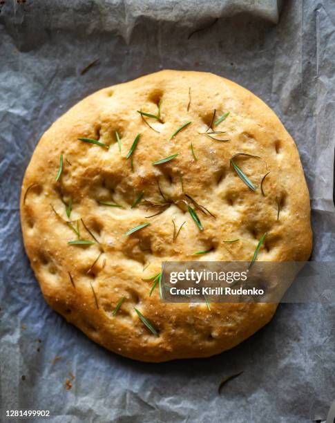 homemade focaccia on a table - fougasse photos et images de collection