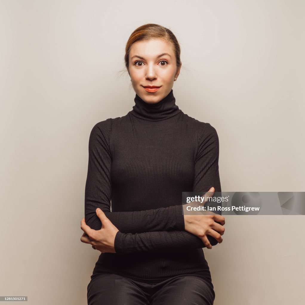 Young Businesswoman Wearing Black Turtleneck High-Res Stock Photo ...
