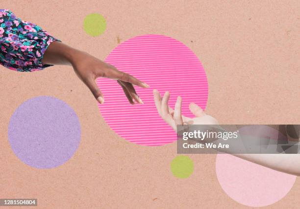 two hands reaching for each other - soporte conceptos fotografías e imágenes de stock