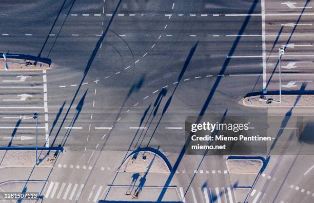 aerial view of an empty urban road intersection - helsinki urban stock-fotos und bilder