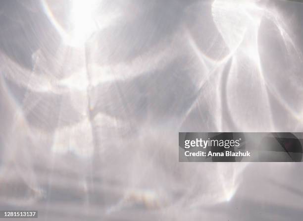 trendy photography effect of sun light reflection over white background for overlay - light beam wall stock pictures, royalty-free photos & images