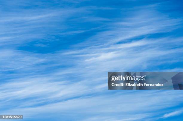 cirrus fibratus clouds - wispy stock pictures, royalty-free photos & images
