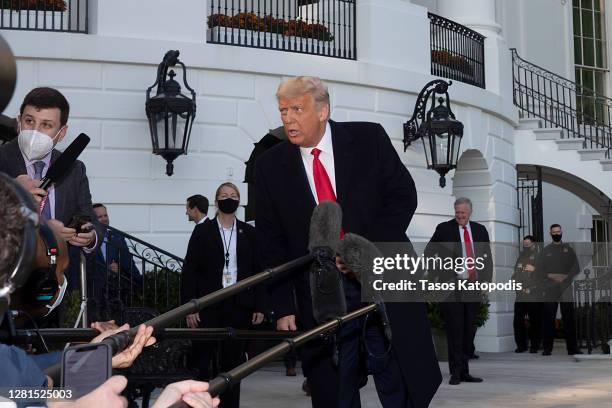 President Donald Trump talks to the media outside the White House on October 21, 2020 in Washington, DC. President Trump is headed to a rally in...