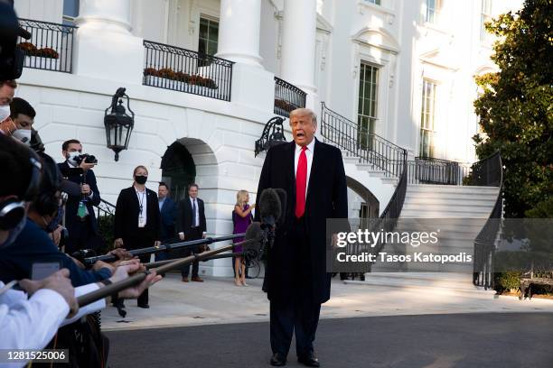 President Donald Trump talks to the media outside the White House on October 21, 2020 in Washington, DC. President Trump is headed to a rally in...