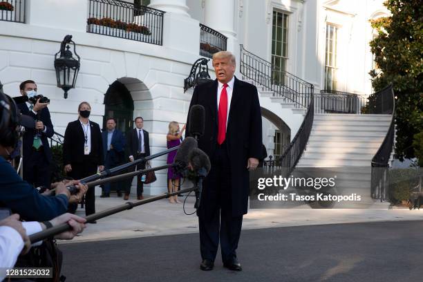 President Donald Trump talks to the media outside the White House on October 21, 2020 in Washington, DC. President Trump is headed to a rally in...