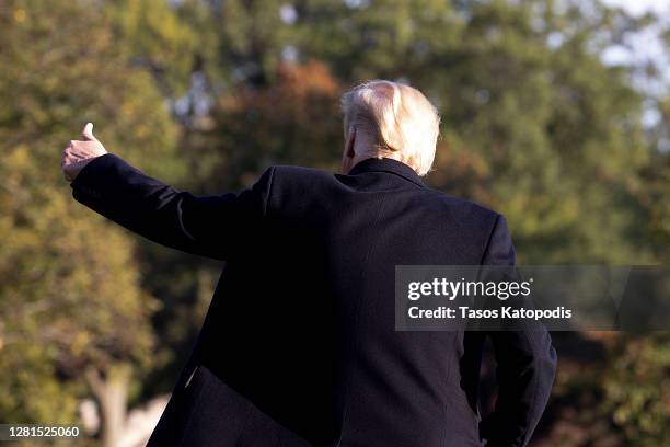 President Donald Trump waves to supporters outside the White House on October 21, 2020 in Washington, DC. President Trump is headed to a rally in...