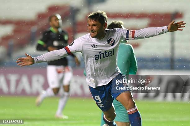 Gonzalo Bergessio of Nacional celebrates after scoring the first goal of his team during a Group F match of Copa CONMEBOL Libertadores 2020 between...