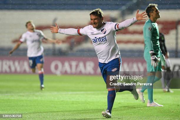 Gonzalo Bergessio of Nacional celebrates after scoring the first goal of his team during a Group F match of Copa CONMEBOL Libertadores 2020 between...