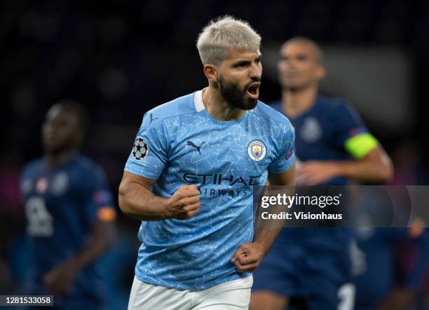 Sergio Aguero of Manchester City celebrates scoring the first goal from a penalty during the UEFA Champions League Group C stage match between...