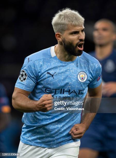 Sergio Aguero of Manchester City celebrates scoring the first goal from a penalty during the UEFA Champions League Group C stage match between...