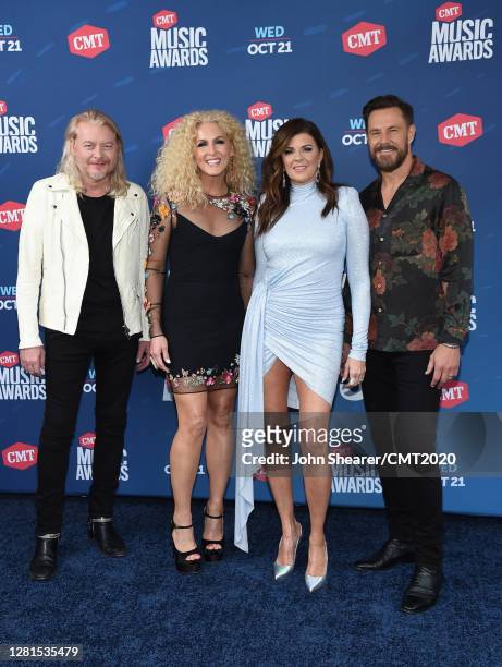 In this image released on October 21, Philip Sweet, Kimberly Schlapman, Karen Fairchild and Jimi Westbrook of Little Big Town attend the 2020 CMT...