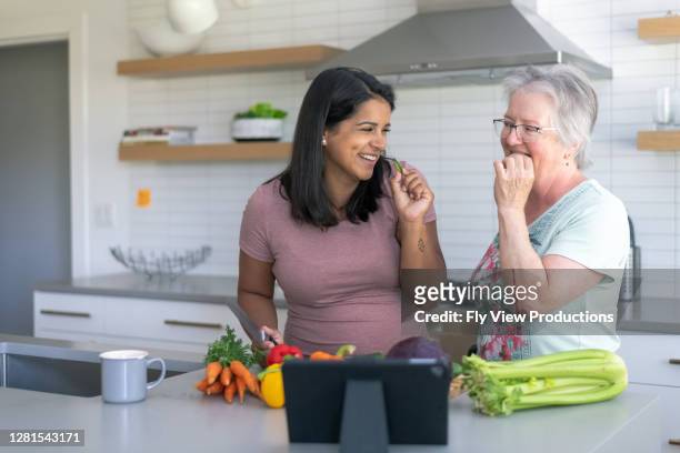 senior woman with nutritionist - nutritionist stock pictures, royalty-free photos & images