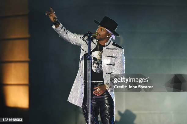 In this image released on October 21, Jimmie Allen performs onstage at the Bicentennial Mall in Nashville, Tennessee for the 2020 CMT Awards,...