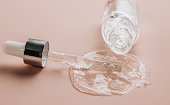 Hyaluronic acid on skin color background with oxygen bubbles.